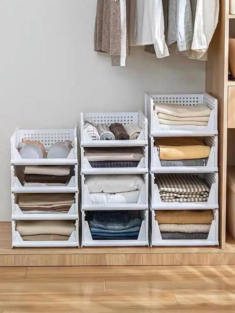 Four Pack Foldable Wardrobe Storage Boxes, Stackable Clothes Drawer Organizers with folded clothes in a closet setup