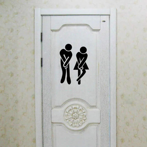 Removable Man And Woman Washroom Sign For Restroom Door Sticker DIY Wall Decor, black PVC, on white door.