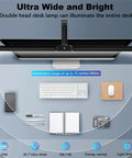 Top view of Ultra Wide Dual Head Desk Lamp With Clamp Mount, 30.7 Inch 24W LED, Eye Protection Lighting illuminating a workspace