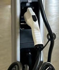 Dual Port Level 2 EV Charger 240V 30A Plug In For Two Electric Vehicles Fast Home Charging Station No Software Or Warranty Included Surplus Out The Door in a warehouse