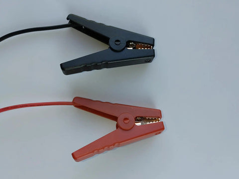 Close-up of red and black crocodile clips from 12 AWG Solar Panel Charging Cable Crocodile Clip To MC4 Connector 60cm Red For Power Station And Solar Panel Charger Lead Acid Battery Charging 12V 24V Easy Plug In Setup