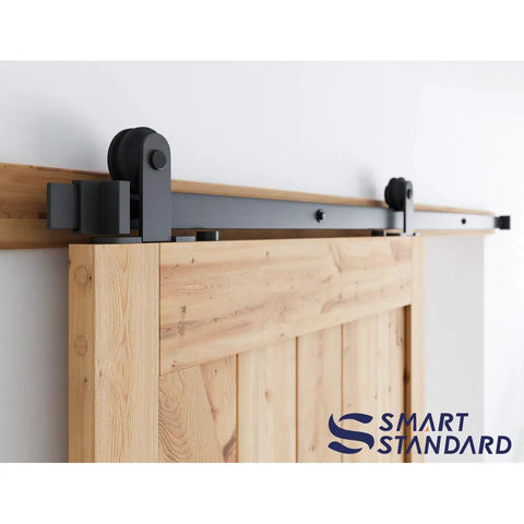 Rock Solid Six Foot Top Mount Sliding Barn Door Hardware Kit showing T Shape design on wooden door