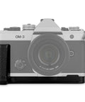 OM System OM 3 Hand Grip Camera Bracket With Arca Swiss Interface attached to OM-3 camera front view