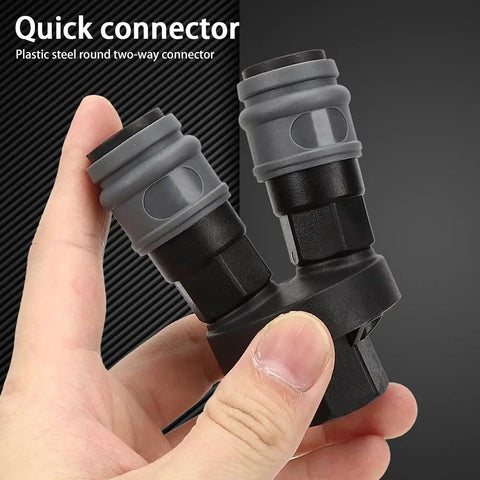 Hand holding Durable Plastic Steel Quick Connector 2 Piece Set For C Type Round Two Way Air Fitting In Compressed Gas Systems