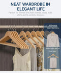 Straight Up Premium Quality Natural Wooden Coat Hangers Thirty Pack Flat Profile with suits and dresses on display.
