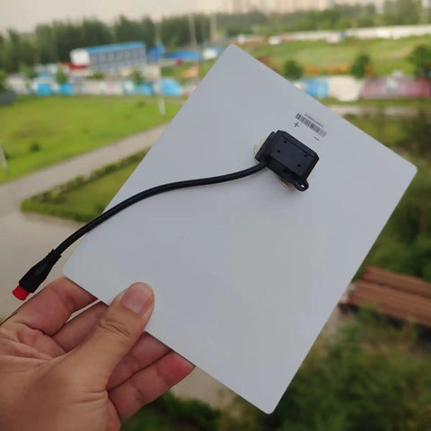Ultra Thin Flexible CIGS Solar Panel Charger For Portable Power On The Go, Waterproof Photovoltaic Solar Cell held outdoors