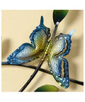 Colorful metal butterfly wall decor with leaf accents, adding elegance to wall spaces, ideal for home interior decoration.