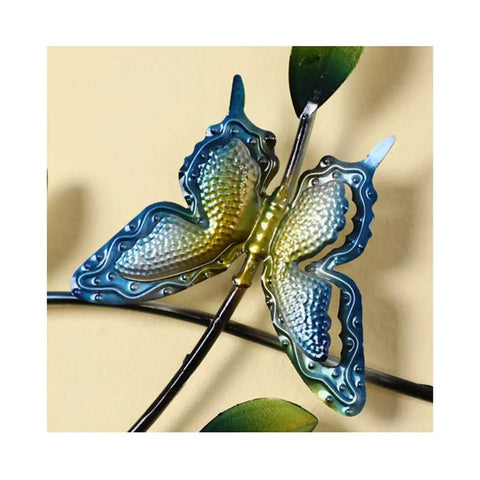 Colorful metal butterfly wall decor with leaf accents, adding elegance to wall spaces, ideal for home interior decoration.