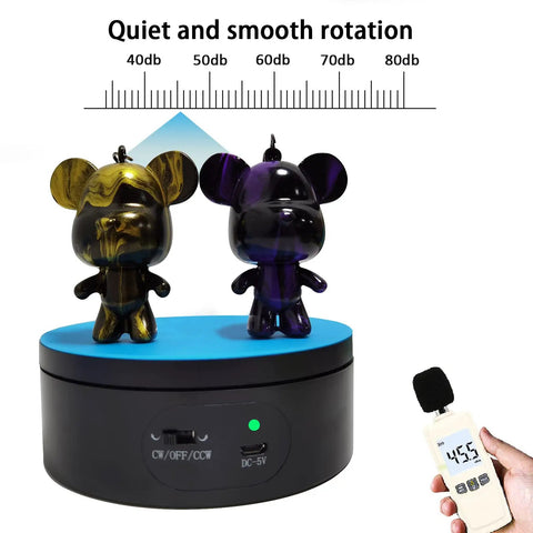 Black Motorized Rotating Display Stand, 360 Degree Automatic Silent Turntable For Epoxy Glitter Tumblers And Cups with two figures.
