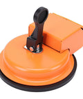 Orange Floor Gap Fixer Tool Pro Grade With 180Lbs Suction Power Portable 4.5 Inch Suction Cup Ergonomic Design on white background