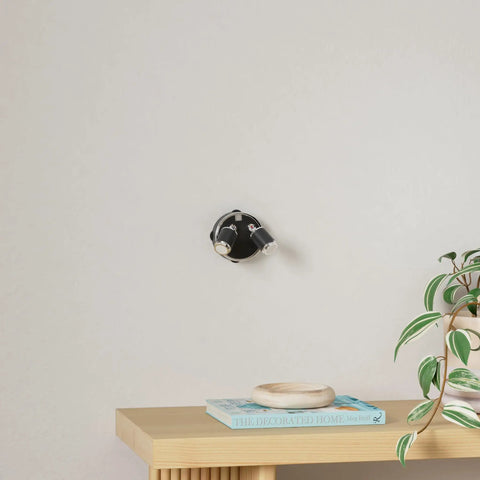 LED Spotlight Battery Operated Light With Remote Control Dimmable Mini Accent Lighting mounted on wall above shelf