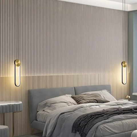 Black And Gold LED Pendant Light With Minimalist Oval Design 10W Warm White Single Hanging Fixture in modern bedroom setting.