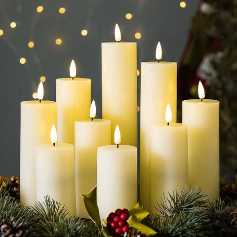 Flameless Votive Pillar Candles Set Of 7 With Remote, Ivory LED Candles arranged with festive decor, realistic flickering flame effect