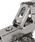 Close-up of hydraulic soft close cabinet hinge with copper core damping system for quiet no slam closings fits corner and wall cabinets.