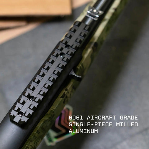 Extended Length Picatinny Rail Mount For Ruger 10/22 Rifles With Forward Extension installed on rifle, close-up.