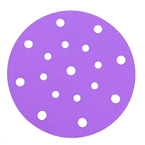 Get Ready For A Slick Finish With These 100 Super Smooth Six Inch Sanding Discs Using Grits From 80 To 600 That Hook And Loop Perfectly For Both Wet Or Dry Jobs On Wood Metal Or Drywall Without Any Mess - Purple sanding disc with dust holes.