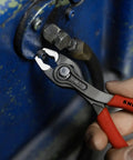 Using TwinGrip Pliers 6 Inch With Front And Side Gripping For Stripped Screws on metal fastener, close-up view