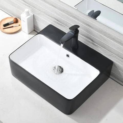 Matte Black Vessel Sink And Faucet Combo For Modern Bathrooms 18x16 Inch Rectangular Above Counter Porcelain Ceramic Vanity Sink With Dual Faucets Pop Up Drain And Water Lines in use