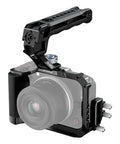 Camera Cage For Canon R50V Full Cage With Silicone Grip and top handle, shown with mounts and accessories attached to camera body.