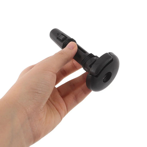 Upgrade Your Ride With Premium 2 Pair Black Plastic Car Seat Headrest Guides featuring Shock Absorption Locking Pins And Round Sleeves For Easy Tool-Free Swap And Secure Fit On Most Vehicle Makes And Models black plastic headrest guide held in hand