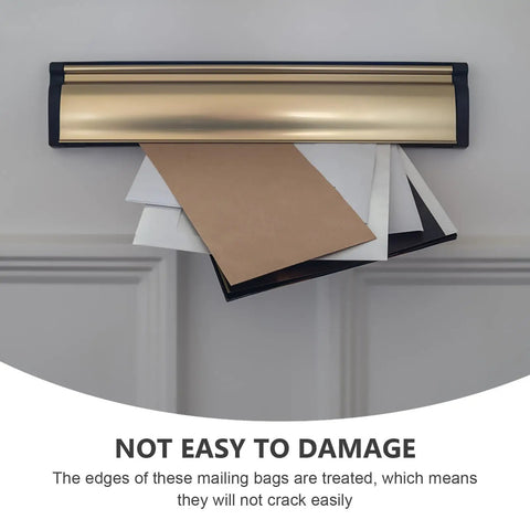 Beige Kraft Bubble Mailers With Self Seal Closure protruding through a gold mail slot, showcasing durable design for safe shipping.