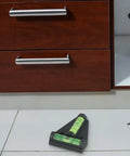 Micpointik T-Shaped Bubble Level, 2-Way Horizontal for spirit Level placed on tiled floor near wooden cabinets with drawers.
