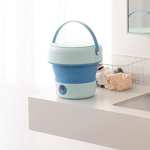 Foldable Mini Washing Machine 4.8 Liter Portable Compact Laundry Soaker for quick rinse on countertop with timer display.