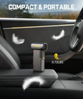 Compact grey B10 Pro Max Cordless Electric Air Duster with 130000 RPM Brushless Motor, shown on car seat armrest.