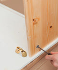 Smooth Operator Brass Concealed Barrel Hinges Six Piece Kit with screwdriver and wood for DIY projects.