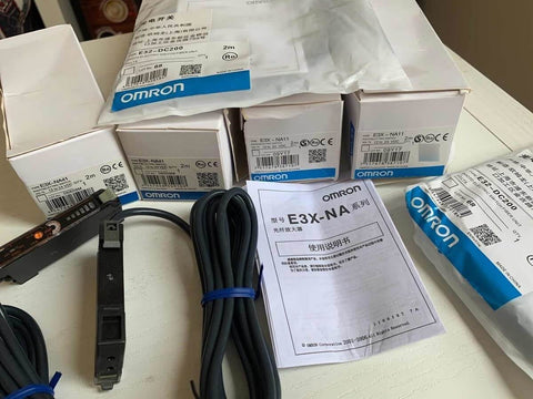 PNP Optical Fiber Amplifier Sensor E3X NA41 Photoelectric Sensor with packaging and manuals, ideal for automation lines