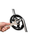 Using Beefy Bottom Bracket Wrench For Bicycle Maintenance And Repair on bike crank with grippy steel design.