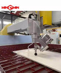 Waterjet cutting machine nozzle head assembly with mounting arm, silver metal, WinWin brand.