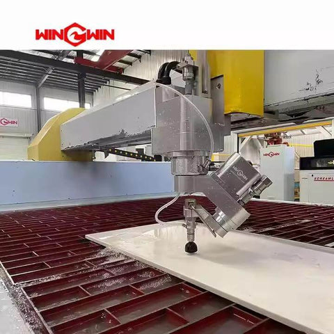 Waterjet cutting head with intensifier pump on a white plate; gray aluminum components; WinWin branding