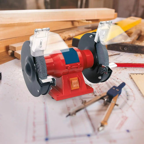 Bench Grinder Eye Shield Glasses on desktop grinder, showing impact-resistant shield for debris and sparks, in workshop setting