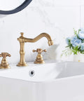 8 Inch Widespread Bathroom Sink Faucet with Two Handles and Three Holes Antique Brass Basin Mixer Tap installed on white sink