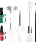 Front view of 7-piece sewing machine cleaning kit: tweezers, double-ended brush, needle board, four screwdrivers