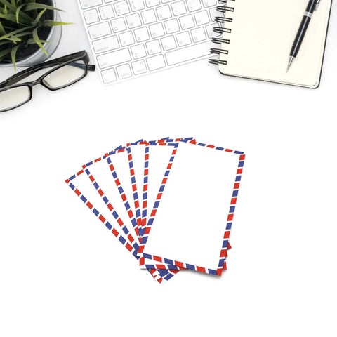 Retro Airmail Envelopes With Aviation Stripes Pack Of 5 10 Or 20 on desk with keyboard, notebook, glasses, and plant