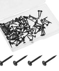 Kickass Black Upholstery Nails And Thumb Tacks Hella Durable Round Head Metal Finishing Hardware in a clear box with 100 dome head fasteners.