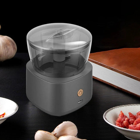 DimyFew Portable Electric Meat Grinder With Stainless Steel Blade And Non Slip Handle, compact size with transparent lid.