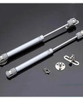 Heavy Duty Pneumatic Gas Struts Hydraulic Cabinet Door Lift Knockout Kitchen Prop Holder set with fittings and screws on black background.