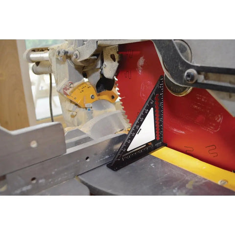 EZ Read 4.5 Inch Aluminum Carpenter Square With Glare-Resistant Finish against saw blade on job site