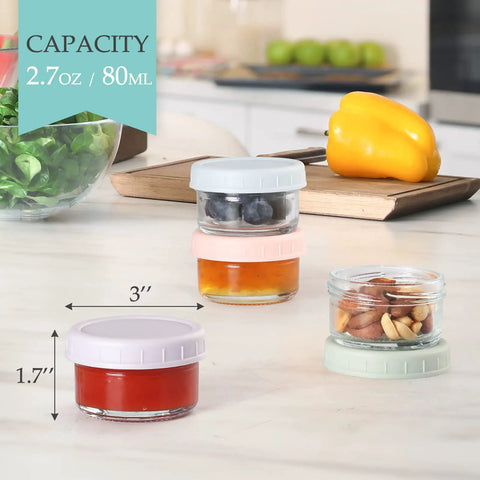 Six Pack 2.7 Oz Glass Salad Dressing Containers With Lids on kitchen counter, showing various fillings and dimensions.