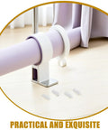 20 Piece Spring Shutter Pins Replacement Kit For Vertical Blinds And Curtains, Durable Plastic Repair Pins With Spring Loaded Plungers, DIY Friendly Fix For Broken Slats, Wobbly Latches, And Window Shutter Systems. White plastic shutter pins with vertical blind slat on floor.
