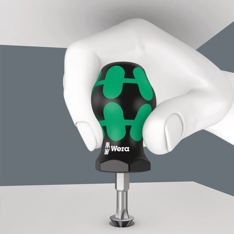 Hand using a screwdriver from 9710 18 Piece Foam Insert Screwdriver Set With Durable Dual Color Foam Organizer, Black and Green handle.