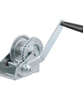 Beefy Manual Hand Crank Boat Trailer Winch For Hauling And Loading, 900 Lb Capacity, Six And A Half Inch Handle, Three Point Two Five To One Gear Ratio, Clear Zinc Finish, Versatile Mounting With Slotted Holes And Ratcheting Lock on white background