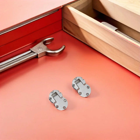 Pro Grade Heavy Duty Hidden Folding Table Leaf Hinges 4 Pack Zinc Alloy Concealed 90 Degree Flush Cabinet Door Hinges shown on a table.