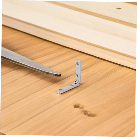 Zinc Alloy Miniature Jewelry Box Hinges 90 Degree Folding Chest Hinges displayed on a wooden surface, showing compact size and design
