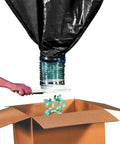 Zero Sweat Loose Fill Dispenser And Packing Peanuts Hopper with large black bag pouring packing peanuts into a cardboard box.