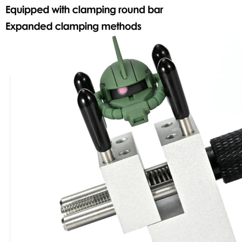 Small Table Vise Clamp With 0-2.48 Inch Grip holding a green model, showcasing its clamping round bar capabilities.