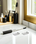 Stainless Steel Towel Bar Mounting Hardware Set with 45x26mm backing plates and screwdriver on bathroom counter